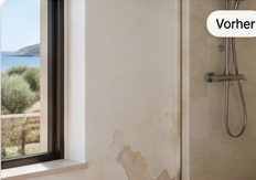 Damp damage on a bathroom wall before repair